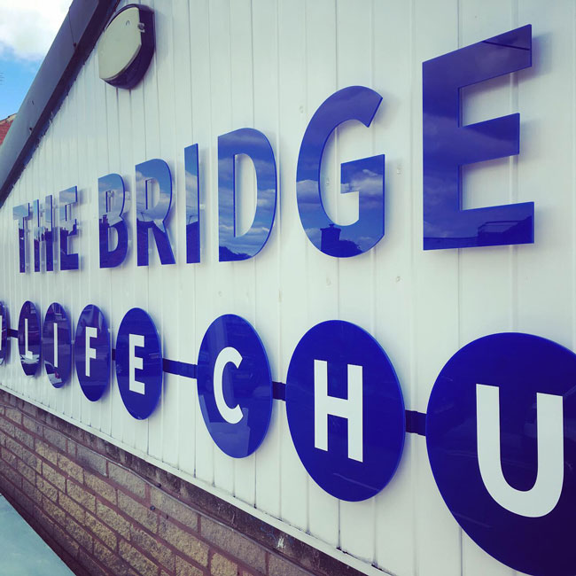 Newly installed acrylic signage for The Bridge Church